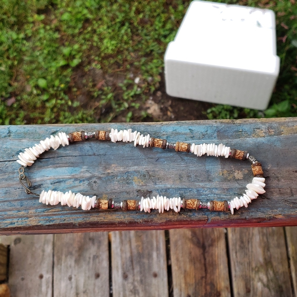 Puka shell and cork necklace Hi baby